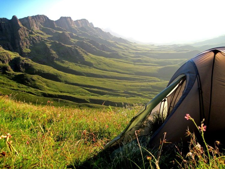 Tent in beautiful grassy valley