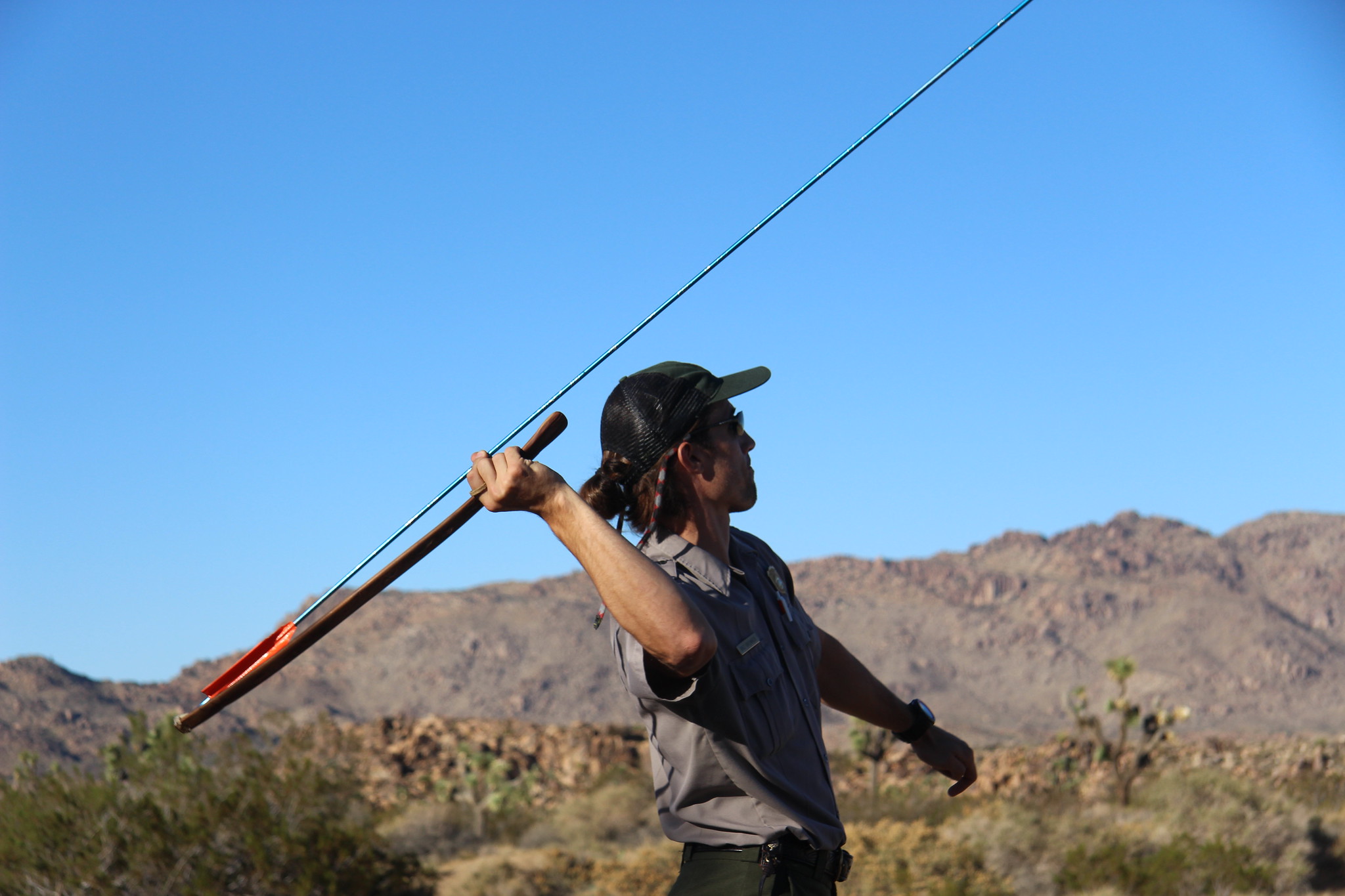 Atlatl Thrower with mountains